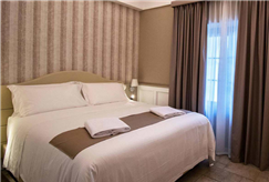 Day Use di 4 Ore in Camera Superior + Pranzo o Cena per 2 persone